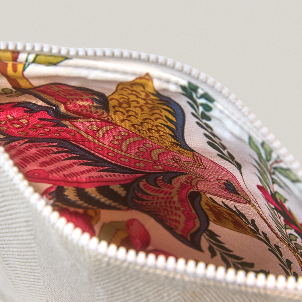 Floral-patterned lining of the BARAU Carry the Calm cosmetic bag