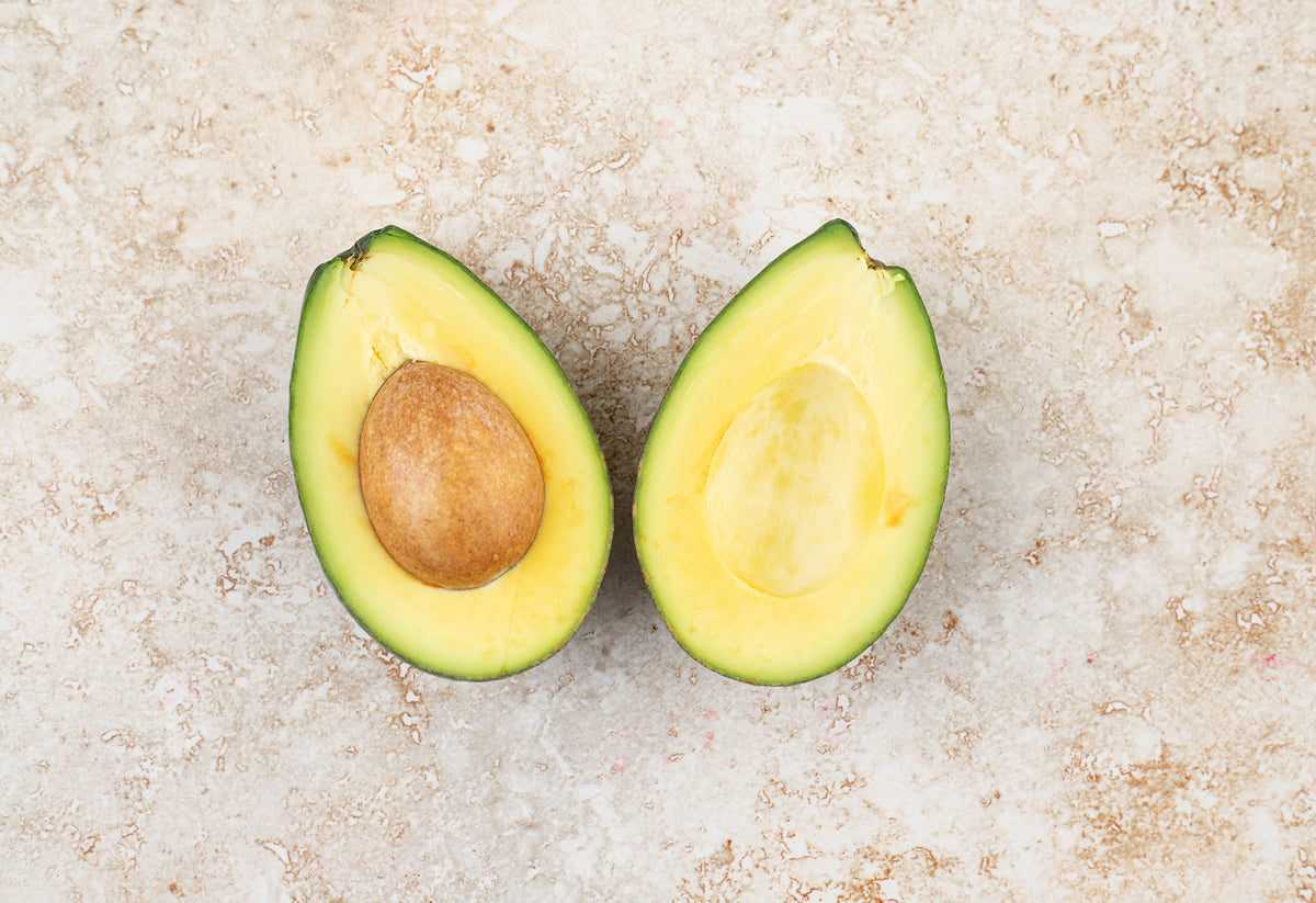 Halved avocado – organic avocado oil
